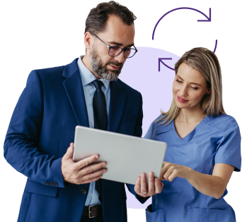 A man showing a physician some data on an iPad.